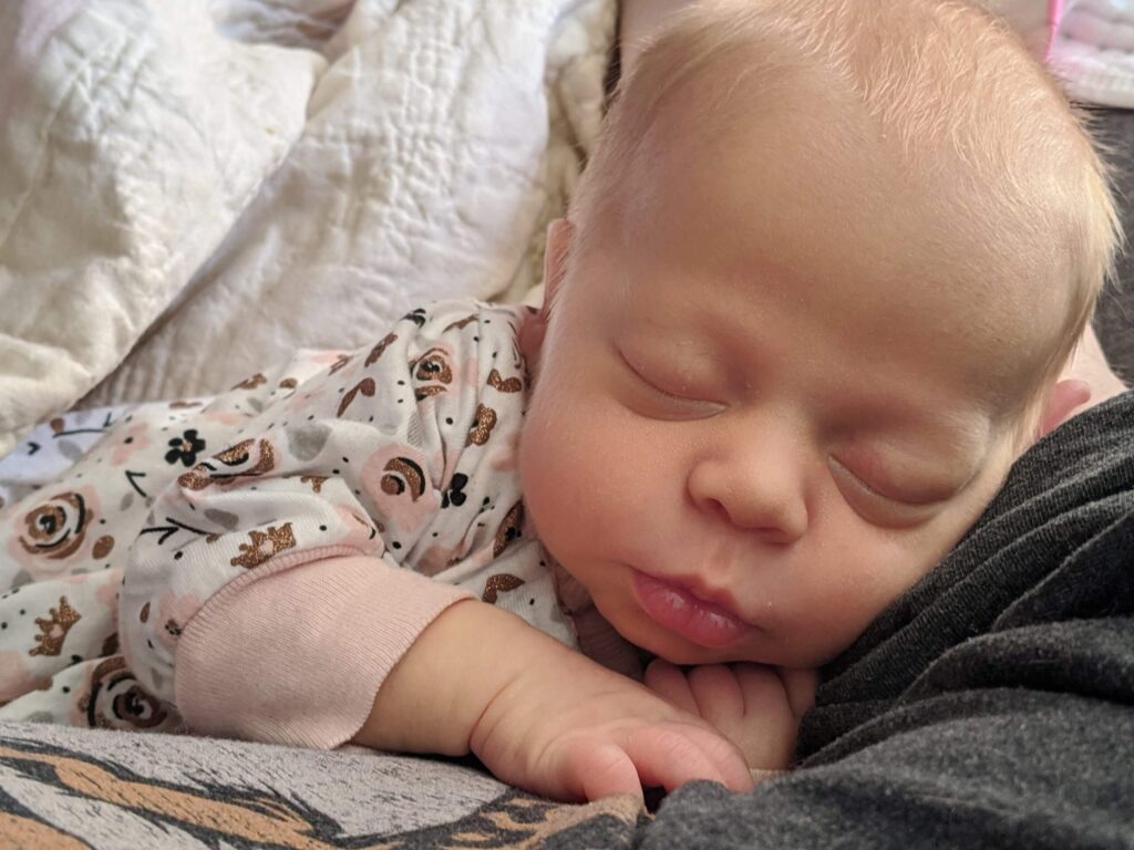 Picture of a baby sleeping that MCRM Fertility helped with