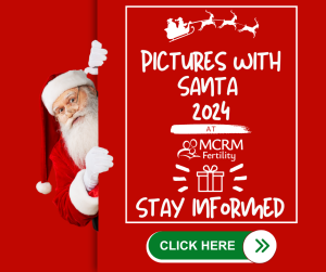 image of santa with sign pictures with santa 2024 at MCRM Fertility